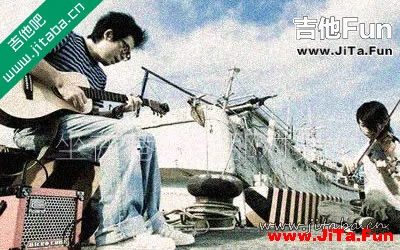 自然卷《坐在巷口的那對男女》吉他譜